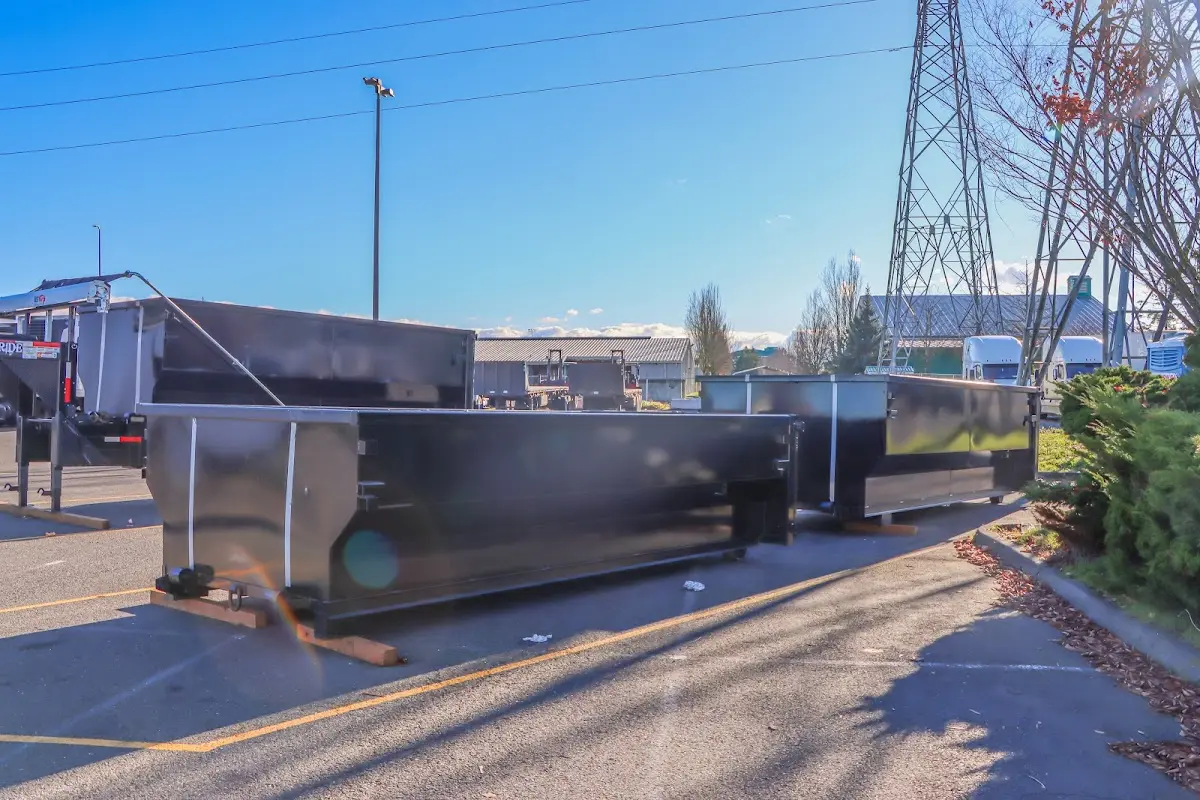 Roll-off dumpster ready for waste disposal at job site for 2 Yard Dumpster Rental in Quincy